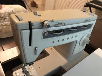 Singer Sewing Machine With Cabinet