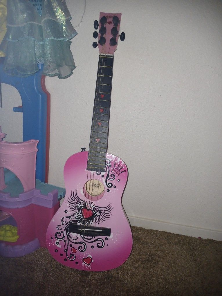 Little Girls Guitar Missing 2 Strings