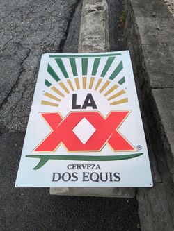 Dos  Equis metal sign