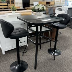 Set of 3, Includes 2 Adjustable Height Bar Stools with Cushioned Backs and 1 Glass Top Table. Perfect for Kitchen, Dining, or Home Bar Use.  💰125$