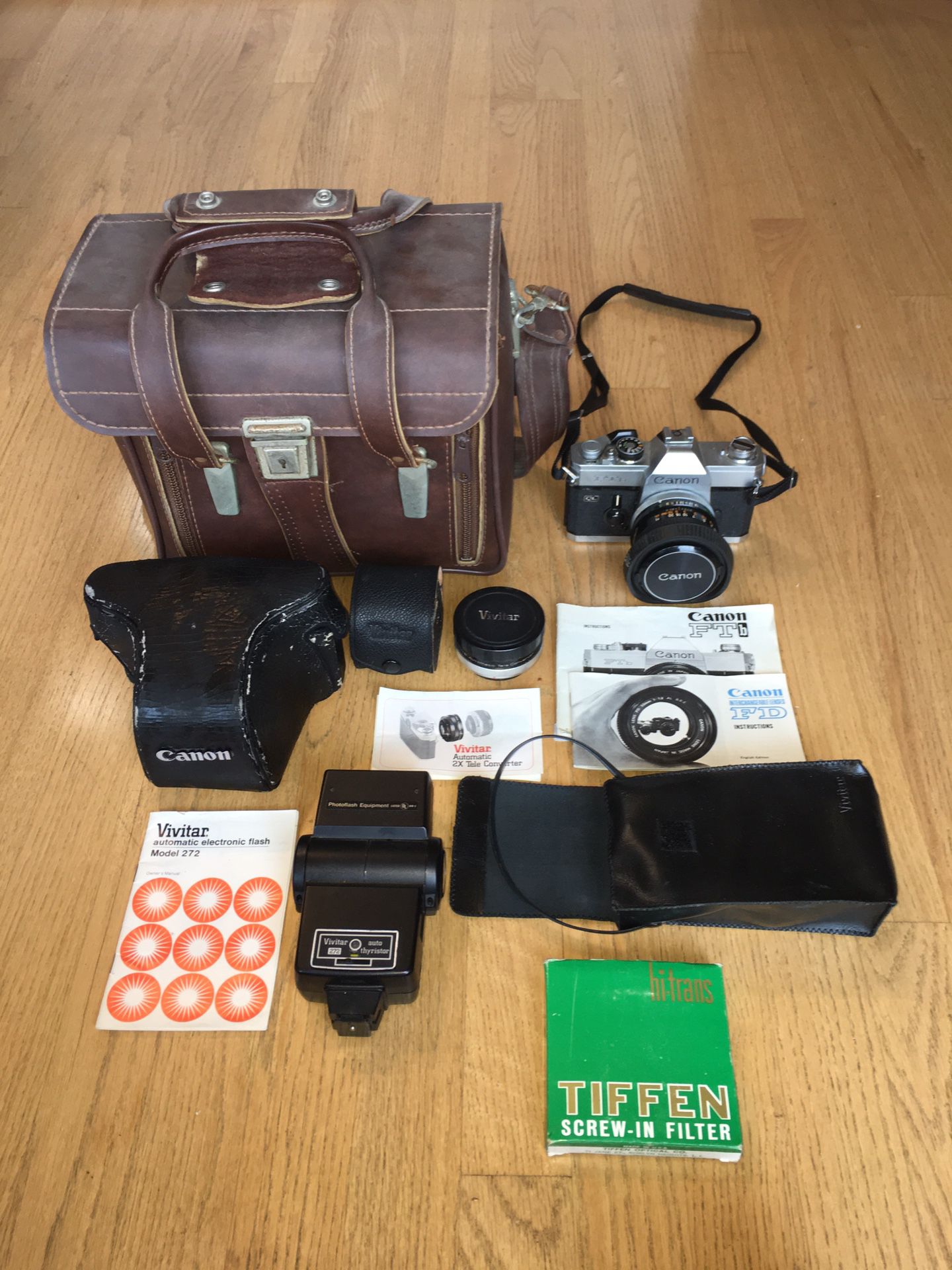Canon FTB QL film camera with accessories