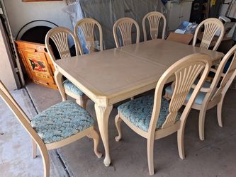 Table with 8 chairs and buffet