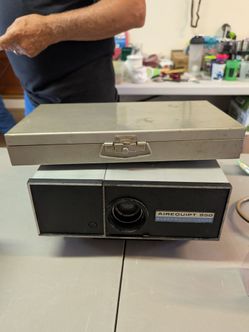 Projector with screen