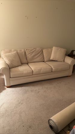 Johnathan Louis cream sofa