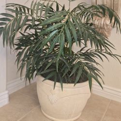 Decorative planter and artifical plant