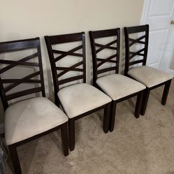 4 dark brown dining room chairs for living room. Very comfortable and stylish.