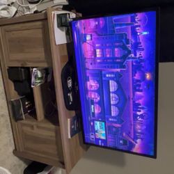 42” LG TV With Roku Hook Up And TV Stand