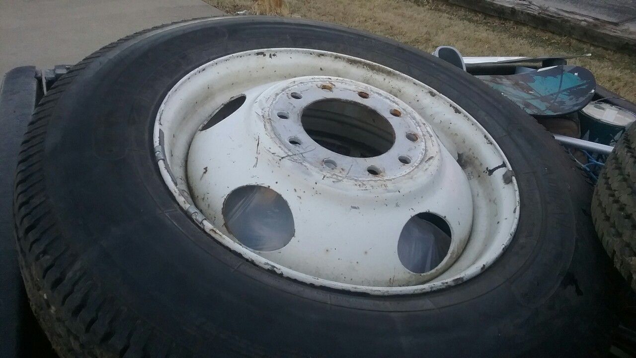 pair of 8R19.5 tires and rims