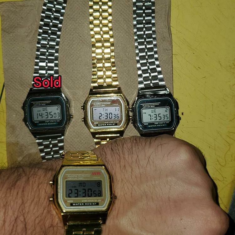 2 left One gold one sliver watch