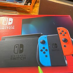 Nintendo Switch Red And Blue NEW IN BOX NEVER OPENED