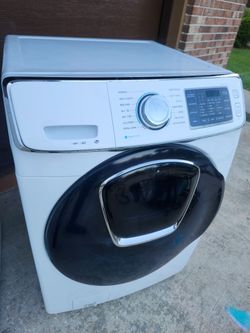 5.0 cu. ft. High Efficiency Front Load Washer with Steam and AddWash Door in White, ENERGY STAR
 Free delivery