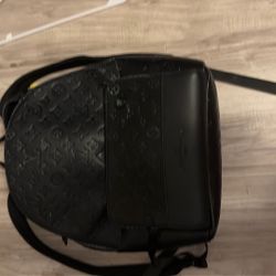 black LV backpack