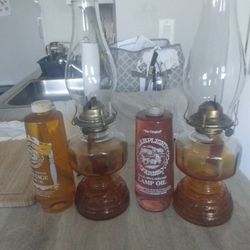 Oil Lamps  by Eagle (Antique?) $30 for Both Lamps and Lamp Oils