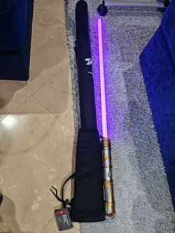 Disneyland Galaxy's Edge Savi's Workshop Protection And Defense v2 Lightsaber  with purple kyber crystal