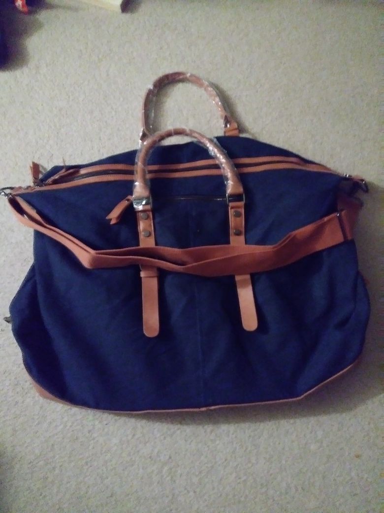 Huge travel bag with straps and handles