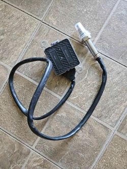 Unused Nitrogen Oxide (NOx) sensor with part number NOS10012.