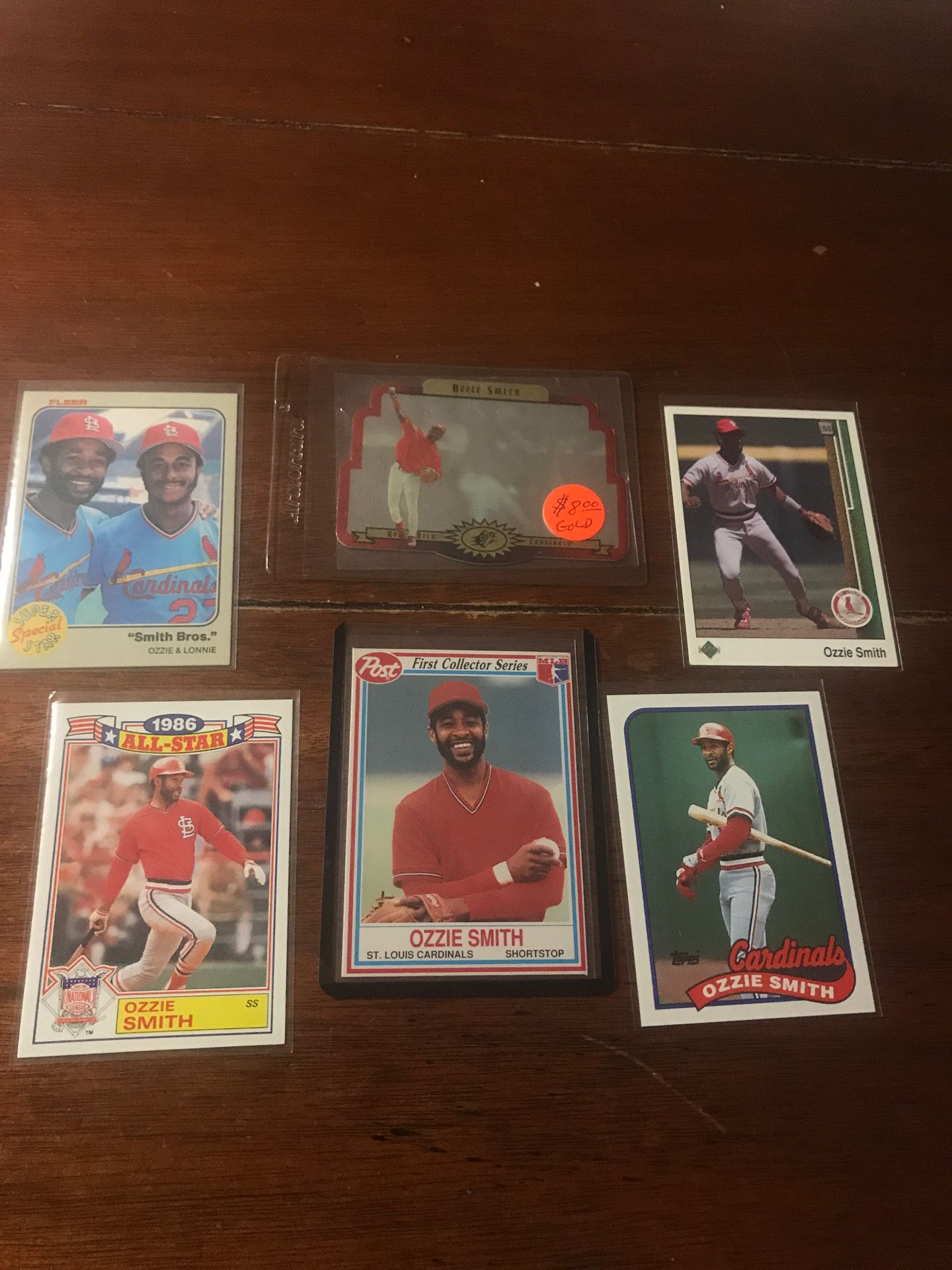Baseball Ozzie Smith hologram card and other cards