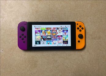 NINTENDO SWITCH MOD with 512GB SD and over 100 POPULAR SWITCH GAMES