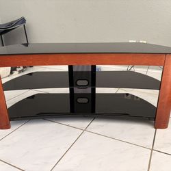 Corner Tv Stand. Wood And Black Glass 