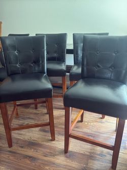 Four counter height chairs