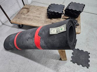 Used heavy-duty 6x(10Ft over) Rubber Carpet Roll. Miami 33130. Delivery fee (optional)

Durable rubber carpet roll. This black material is over 10 fee