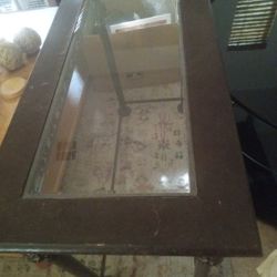 wooden coffee table with glass top