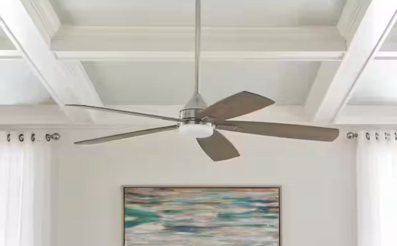 The Home Decorators Collection 52 in. Brushed Nickel Ceiling Fan offers reversible tea stained oak/oil rubbed oak blades. The integrated LED light kit
