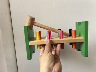 pegboard with a hammer