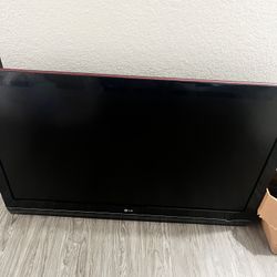 LG TV w/bracket & remote