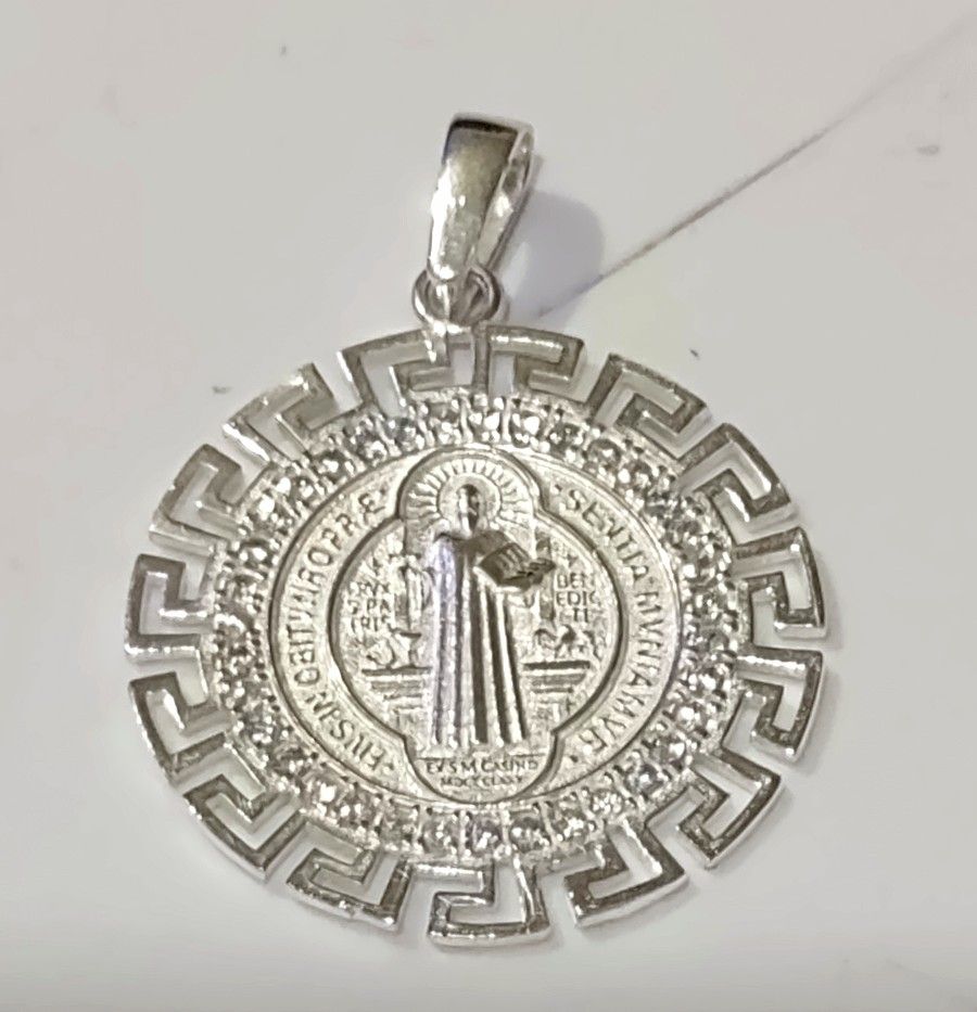 Sterling silver saint pendant. 