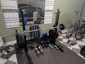 Gym Squat Rack and Weight Plates