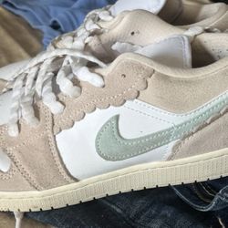 Nike This is a Nike Air Jordan 1 Low SE 'Scalloped Edge' (GS) in the Sail/White/Mint Candy colorway