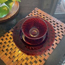 Beautiful red World Market plates and bowls set