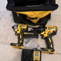 Dewalt 20V kit includes 1/4” impact gun, 1/2” drill, BRUSHLESS, 1 - Battery, charger and Bag NEW 