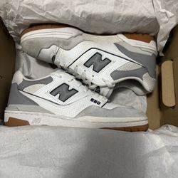 grey and white new balance 550