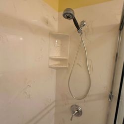 Kohler shower head spout and handle.