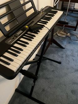 Casio Electric Keyboard with Stand