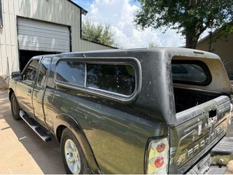 Small truck camper shell