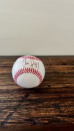 Autographed MLB baseball by Elias Diaz with hologram