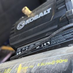 Compressor, Shop Vac and Trimmer. 