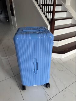 Rimowa sea blue trunk plus luggage