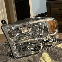 09-18 ram driver headlight 