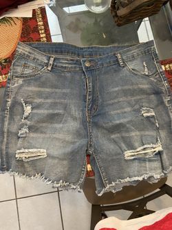 Distressed jean shorts and tank top