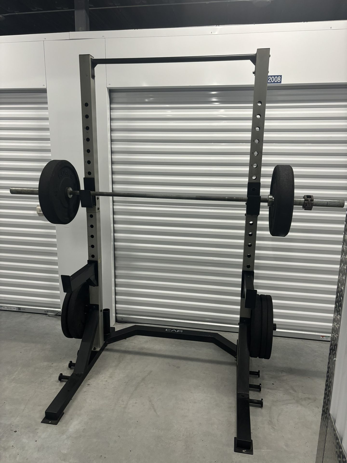 Squat Rack, Weights And Bar. Exercise Equipment