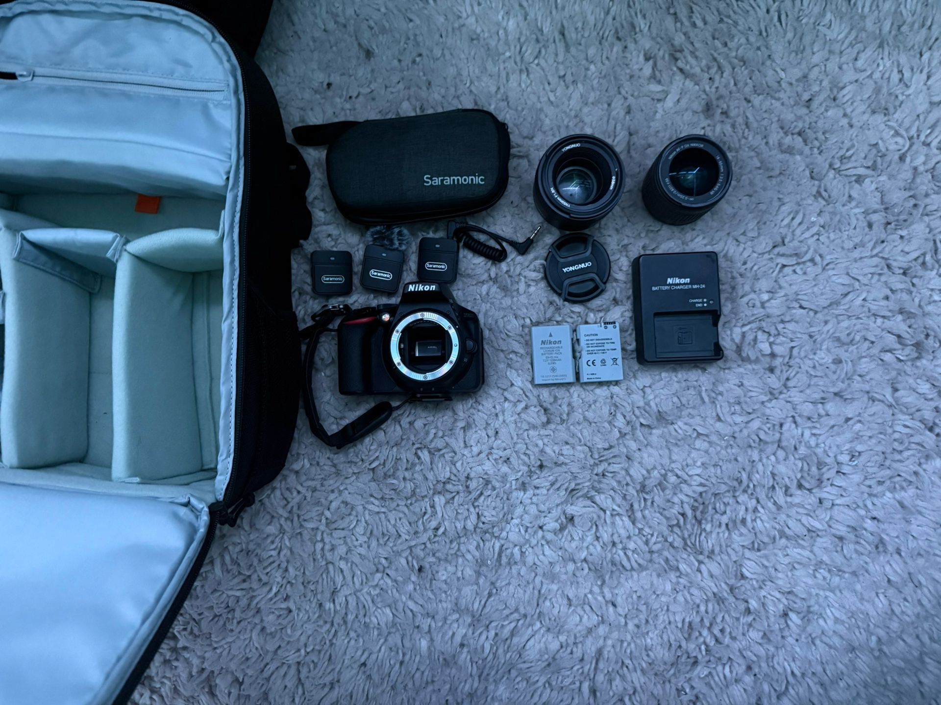 Nikon D5600 DSLR w/2 lenses, 2 batteries, charger, Saramonic mic set, and bag