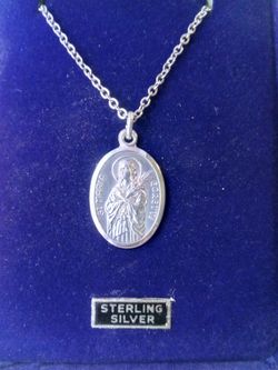 Sterling Silver St Maria Medal on an 18 inch stainless steel chain.
