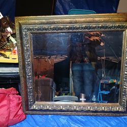 Victorian style wood frame beveled mirror