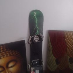 Kemper Storm Series snowboard with bindings attached. 
