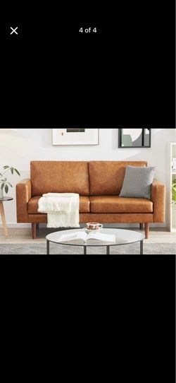 Brown faux leather loveseat