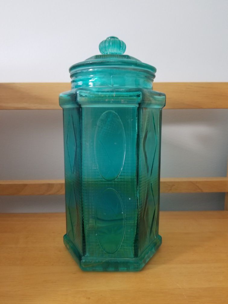 Glass storage container in turquoise and removable top